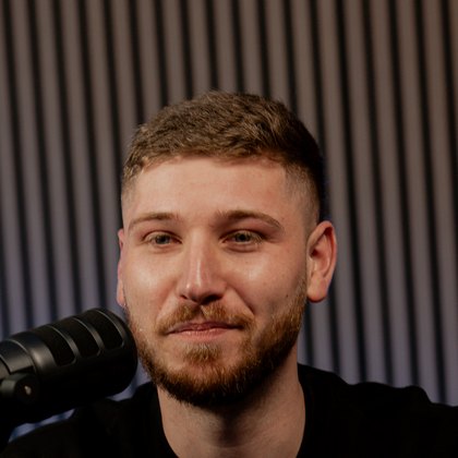 Jackson Morton at the microphone in the Better Conversations studio.